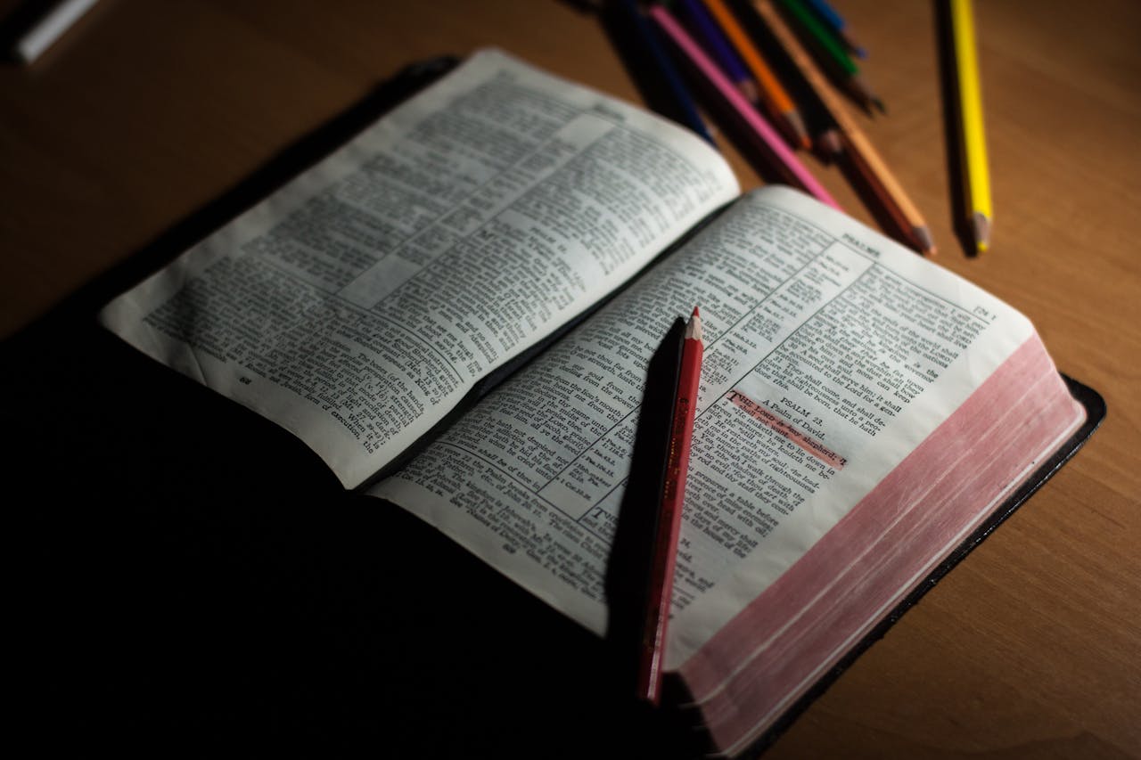 bible and pencils